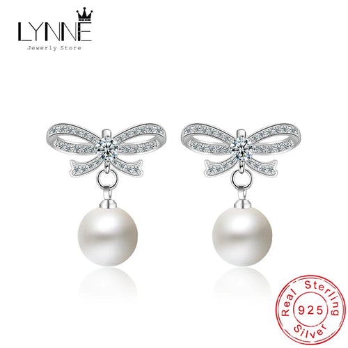 Pearl Bow Drop Earrings