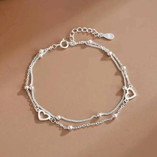 Sterling Silver Hollow Heart Bracelet
